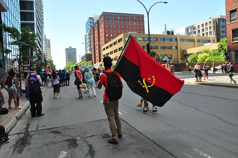 Angola Flag Montreal 29524539128 دولة إفريقية تعتزم زيادة أجور الموظفين بنسبة 25% في الربع الأول من 2025